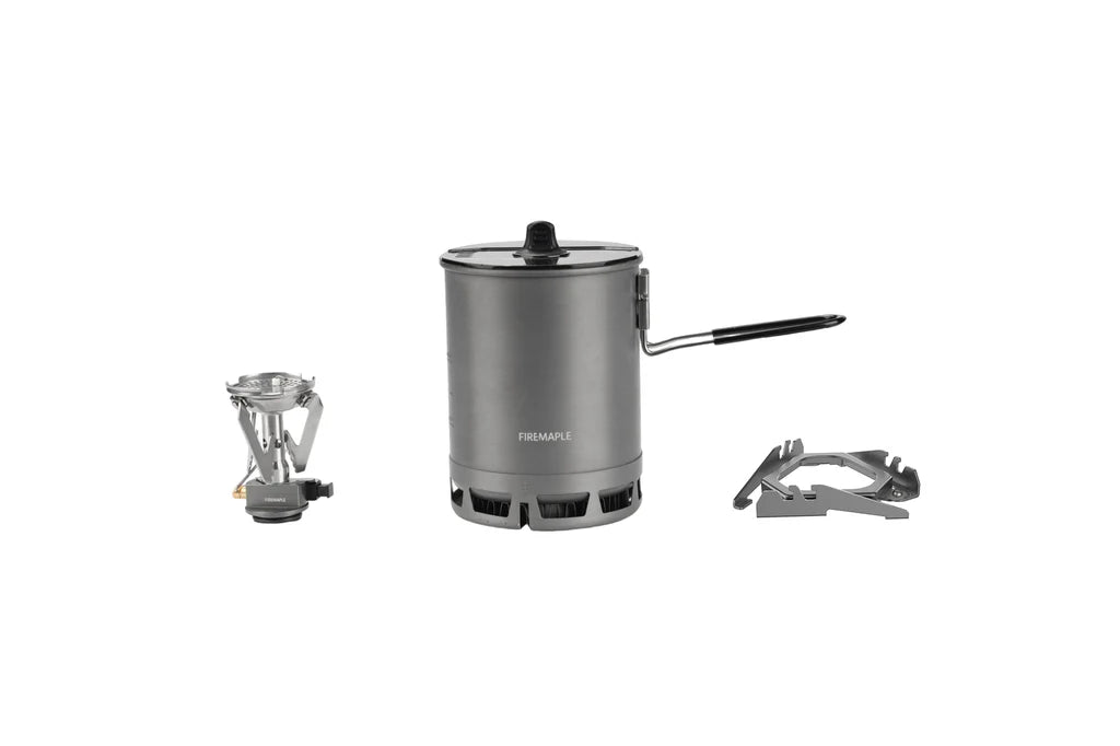 Portable camping stove with accessories on a white background