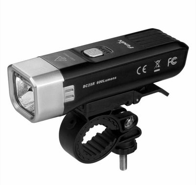 Bicycle headlight with mounting bracket on a white background