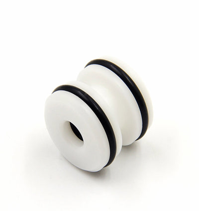White mechanical component with black rubber seals on a white background