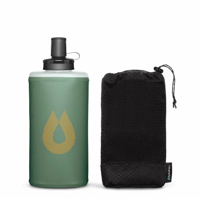 Green water bottle with black cap and black mesh pouch on a white background