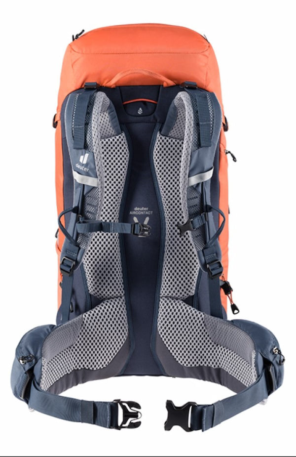 Orange and blue backpack with visible brand logo on a white background