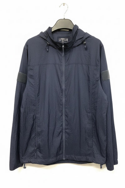 A dark navy hooded lightweight jacket hanging on a black hanger against a plain white background. The jacket features a full-length front zipper, a drawstring hood, zippered hand pockets, and dark gray sleeve patches.