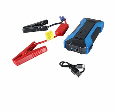 Car jump starter with clamps and cables on a white background