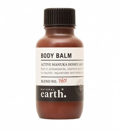Body balm bottle with a white label on a white background