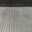 Close-up of a textured surface with parallel lines