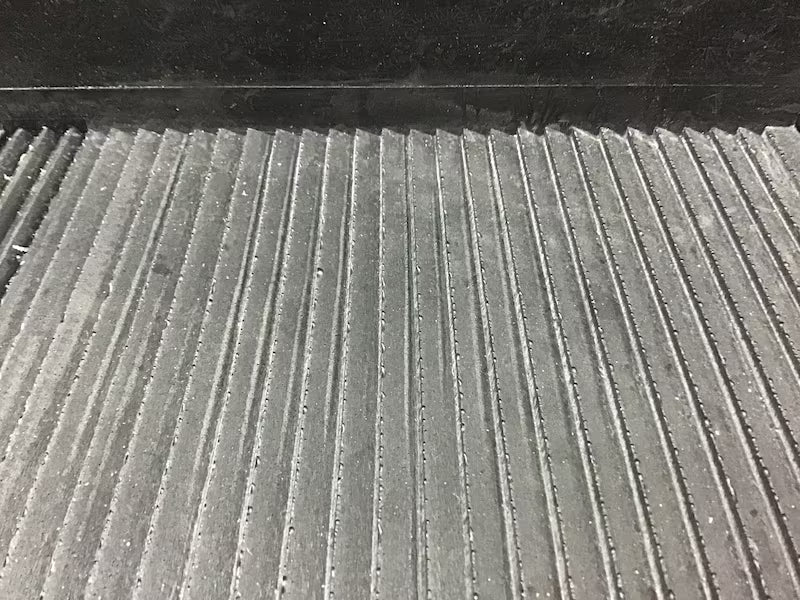 Close-up of a textured surface with parallel lines