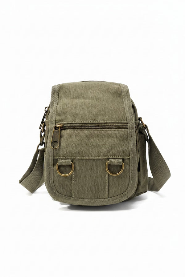 Green canvas bag with gold accents on a white background