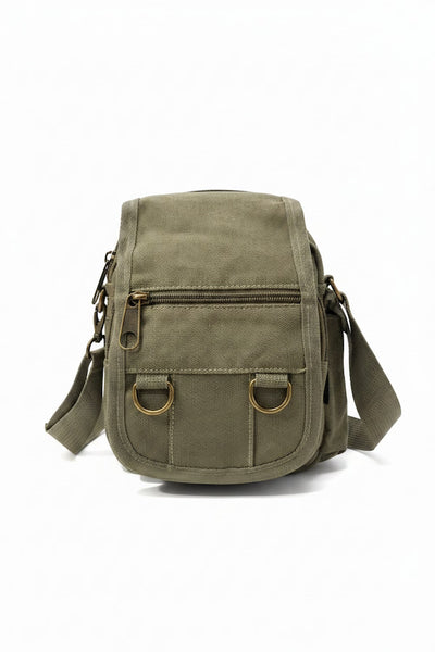 Green canvas bag with gold accents on a white background