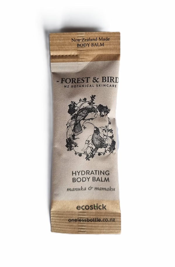 Hydrating body balm packaging with wooden applicator on a white background