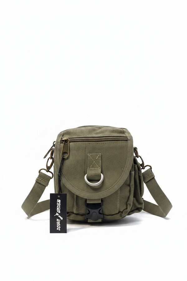 Green shoulder bag with a visible brand tag on a white background