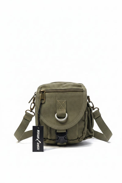 Green shoulder bag with a visible brand tag on a white background