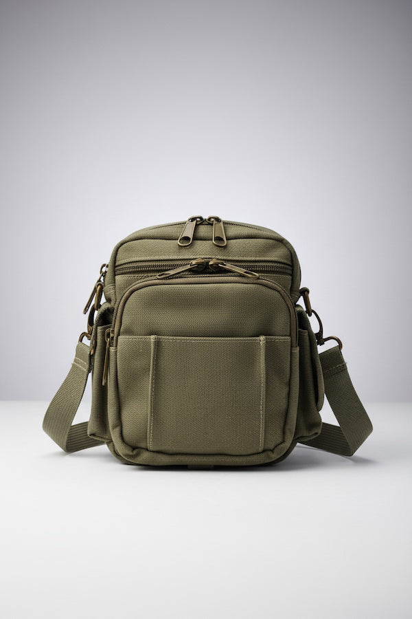 Green backpack on a white background