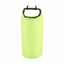 Green dry bag with a black strap on a white background
