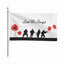 Flag with soldiers and poppies design, featuring 'Lest We Forget' text.