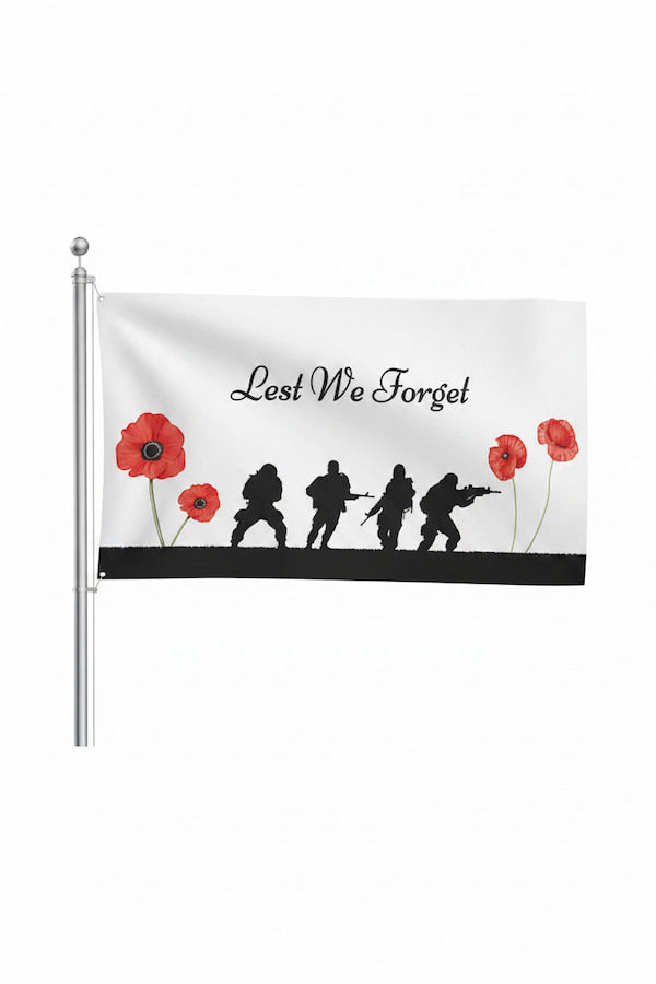 Flag with soldiers and poppies design, featuring 'Lest We Forget' text.
