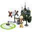 A toy military vehicle set with a small figure, including an olive green armored car, a mounted spring device, a metal detector on a green circular base, and a beige-clad minifigure, shown on a white background.
