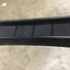 Black metal ramp on a concrete floor
