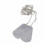 Two metallic dog tags on a chain against a white background