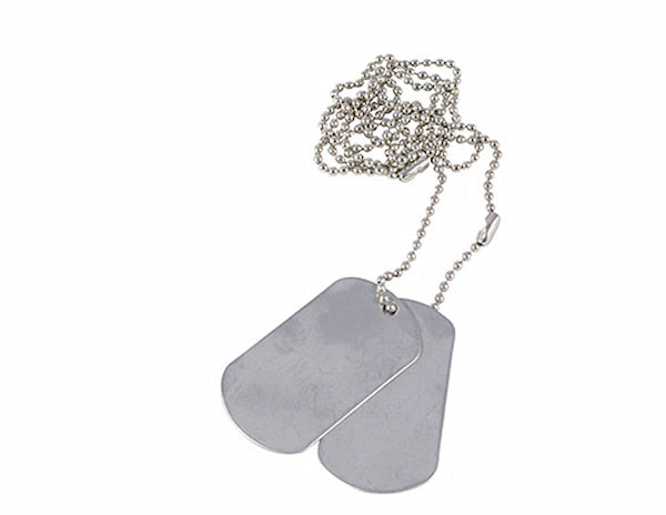 Two metallic dog tags on a chain against a white background