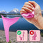 Pink menstrual cup with usage instructions against a scenic background