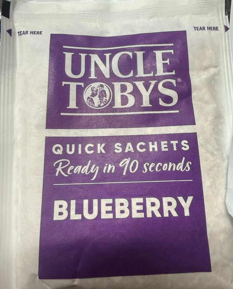 Uncle Toby's blueberry quick sachets packaging with purple label.