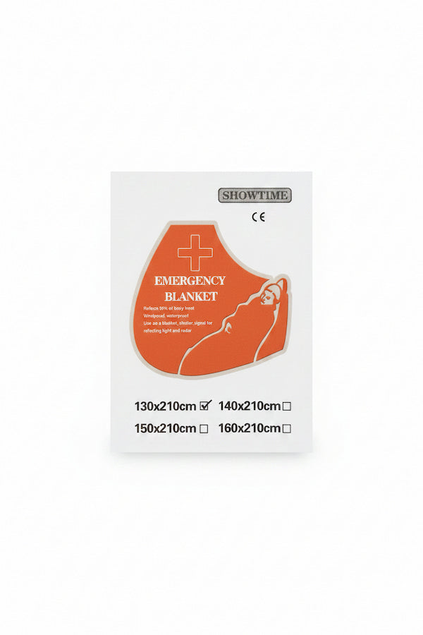 A white packaging card for a Showtime brand emergency blanket, featuring an orange graphic of a face inside a blanket with text reading 'EMERGENCY BLANKET' and size options in centimeters.