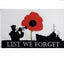 Memorial flag with silhouette of a soldier, red poppy, and ship, featuring 'Lest We Forget' text.