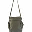 An olive green nylon shoulder bag with a long adjustable strap, a front zippered pocket, and side pockets, shown against a plain white background.