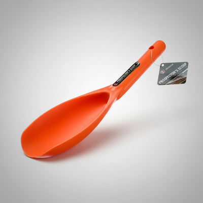 Orange scoop with a tag on a gray background