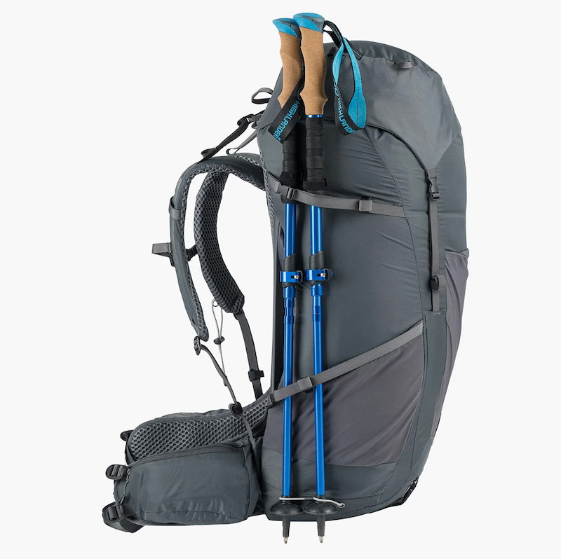 Gray hiking backpack with blue poles on a white background