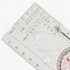 Optical instrument with measurement scales on a white background