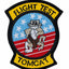 Patch with 'Flight Test Tomcat' text and a tiger design on an American flag background.