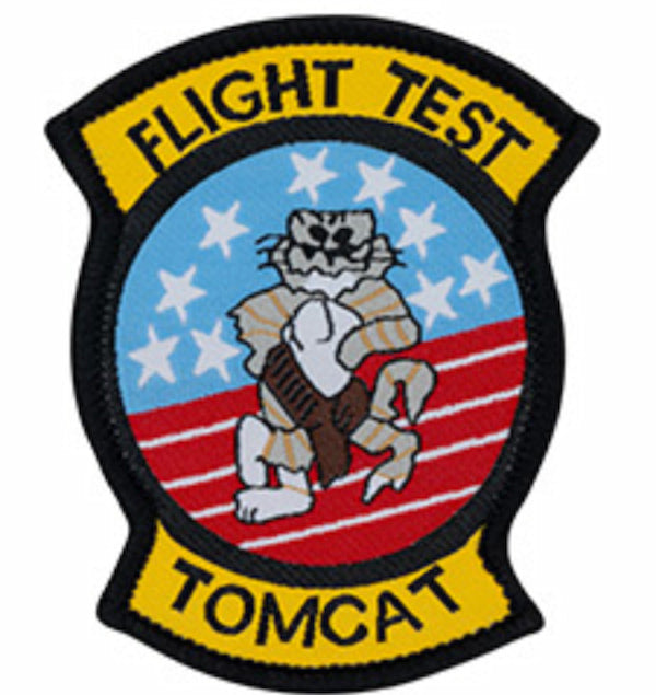 Patch with 'Flight Test Tomcat' text and a tiger design on an American flag background.