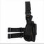 Black tactical holster with multiple straps on a white background
