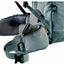 Close-up of a baby carrier with straps and padding on a white background