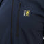 Navy blue jacket with a logo patch on the chest against a gray background