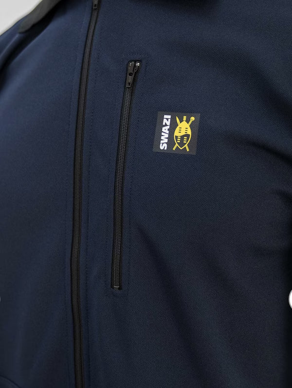 Navy blue jacket with a logo patch on the chest against a gray background