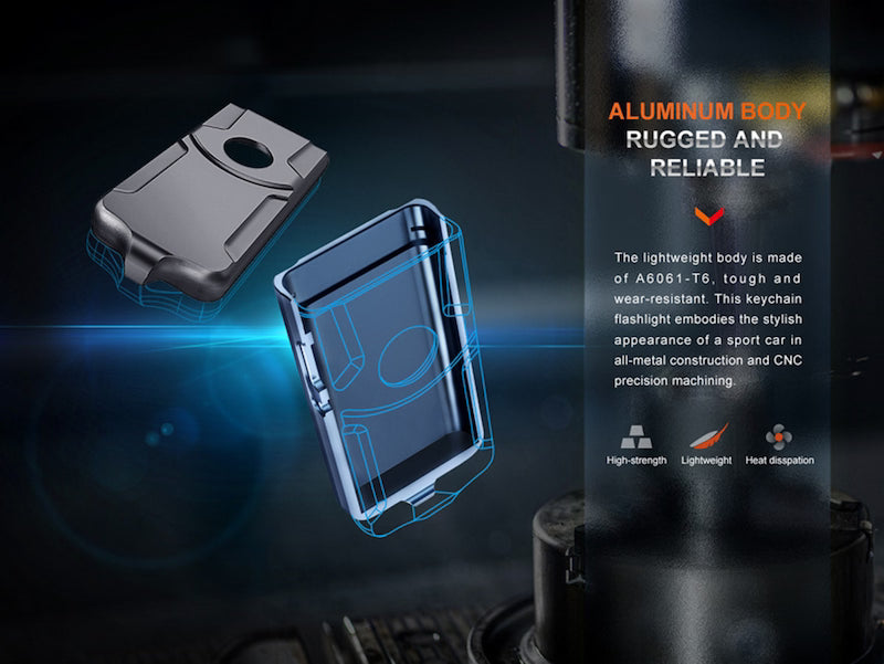Keychain flashlight with aluminum body on a dark background