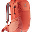 Orange backpack with visible brand logo on a white background