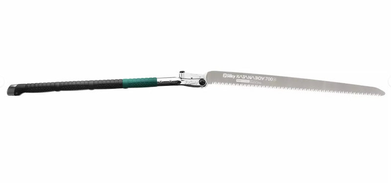 Gardening saw with a black and green handle on a white background