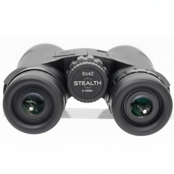 Black binoculars with a central dial labeled '8x42 STEALTH 3-1200m' on a white background.