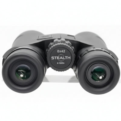 Black binoculars with a central dial labeled '8x42 STEALTH 3-1200m' on a white background.