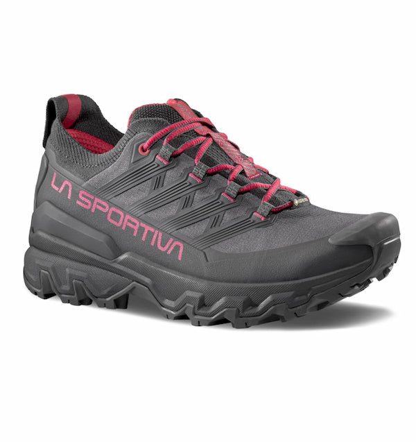Gray hiking shoe with red accents and 'La Sportiva' branding on a white background