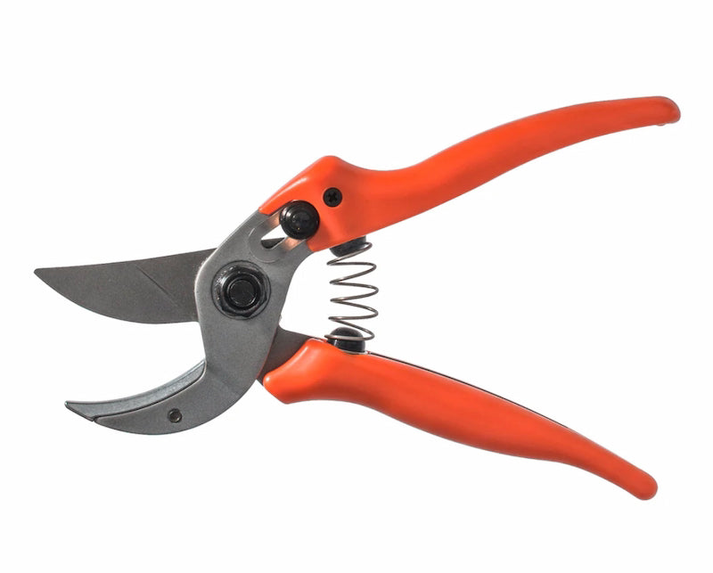Gardening pruner with orange handles on a white background