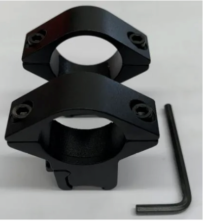 Two black metal rings with a wrench on a white background