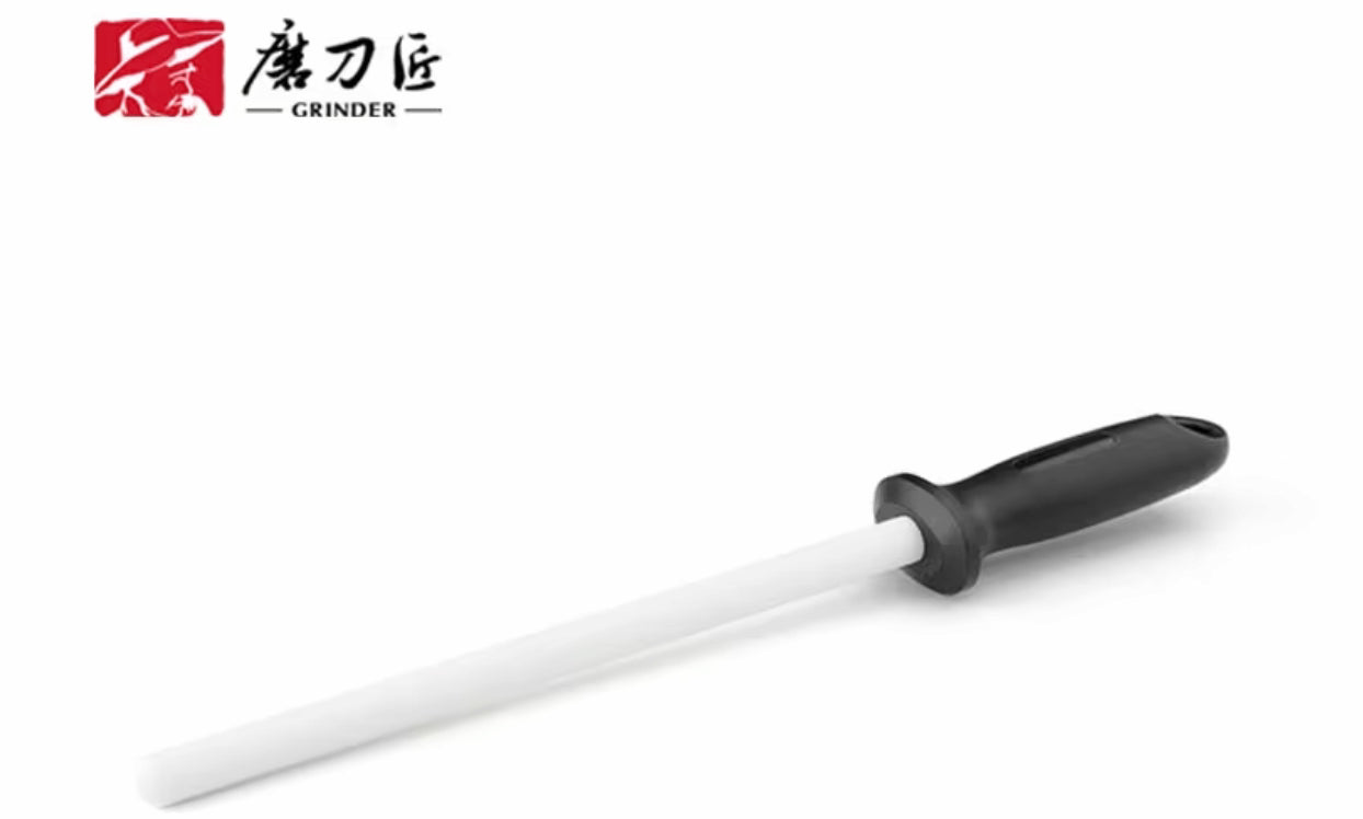 Knife sharpener with black handle and white blade on a white background, featuring the brand '磨刀匠'.