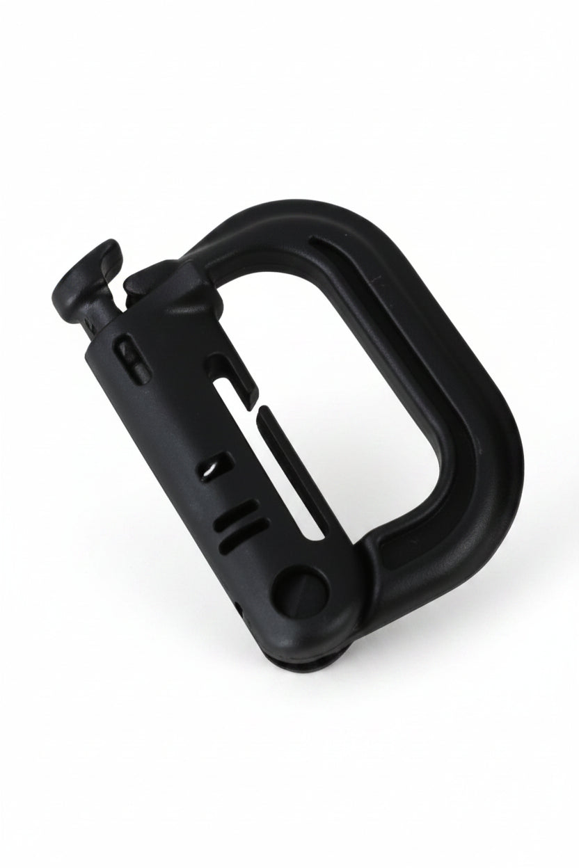 Black plastic clip on a white background