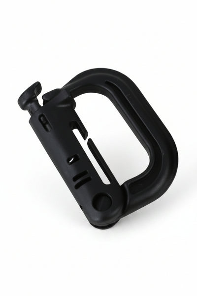 Black plastic clip on a white background