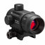 A black tactical red dot sight rifle scope with a red laser lens visible, featuring adjustment knobs and a mounting base, shown on a plain white background.