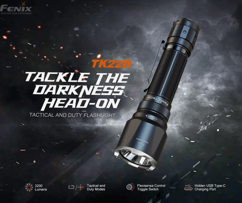 A Fenix TK22R tactical flashlight shown at an angle against a dark smoky background with text reading 'TACKLE THE DARKNESS HEAD-ON' and feature callouts at the bottom.